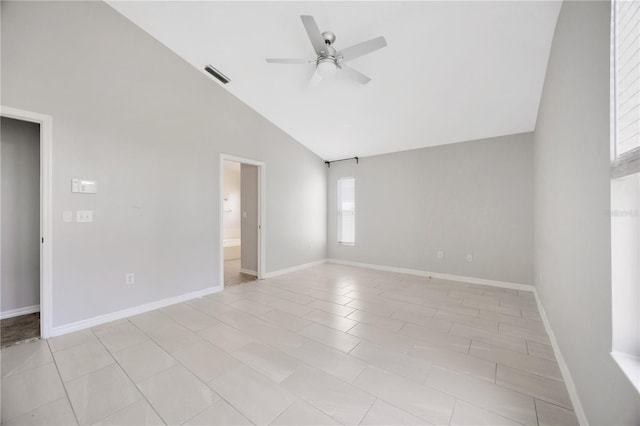 25101 Hyde Park Blvd, Land O Lakes, FL 34639 - empty room featuring a ceiling fan, baseboards, and high vaulted ceiling