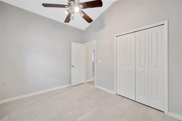 25101 Hyde Park Blvd, Land O Lakes, FL 34639 - unfurnished bedroom featuring high vaulted ceiling, a closet, baseboards, and ceiling fan