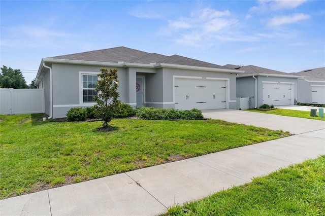 14532 Whitewater Way, Brooksville, FL 34604 - view of front facade featuring stucco siding, an attached garage, and concrete driveway
