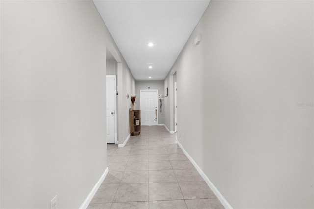 14532 Whitewater Way, Brooksville, FL 34604 - hall with recessed lighting, light tile patterned floors, and baseboards