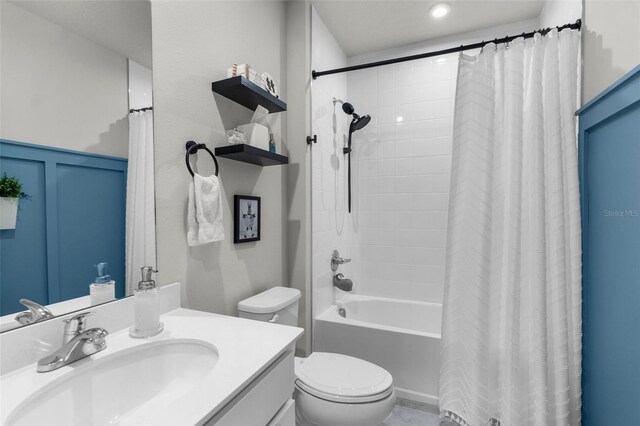 14532 Whitewater Way, Brooksville, FL 34604 - bathroom with toilet, vanity, and shower / bathtub combination with curtain