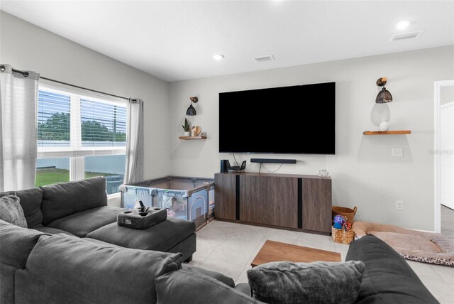 14532 Whitewater Way, Brooksville, FL 34604 - living area featuring light tile patterned floors and recessed lighting