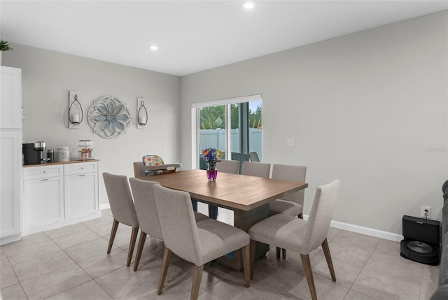 14532 Whitewater Way, Brooksville, FL 34604 - dining space with light tile patterned floors, recessed lighting, and baseboards