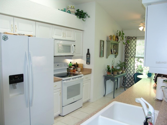 1605 Send Way, Lutz, FL 33549 - kitchen featuring white appliances, a ceiling fan, white cabinetry, and light countertops