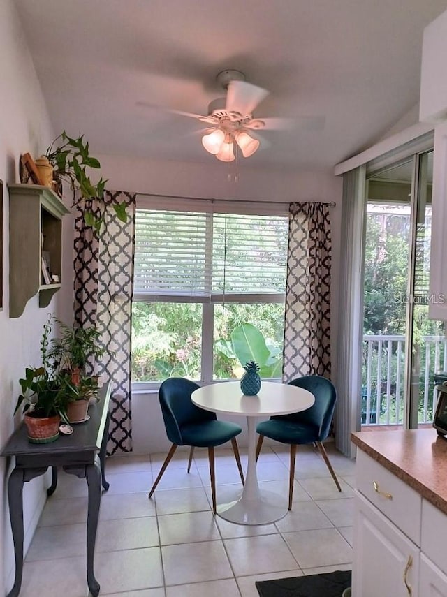 1605 Send Way, Lutz, FL 33549 - dining room with plenty of natural light, light tile patterned flooring, and a ceiling fan