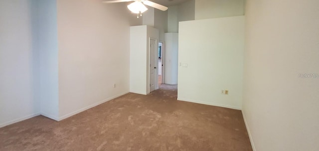 1605 Send Way, Lutz, FL 33549 - carpeted spare room featuring ceiling fan and a high ceiling