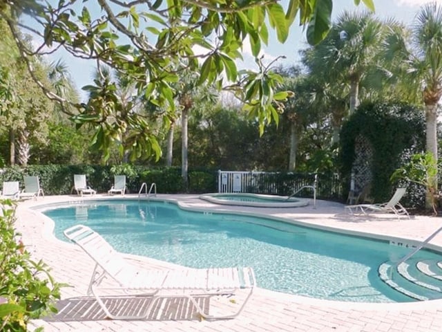 1605 Send Way, Lutz, FL 33549 - community pool with a hot tub and a patio