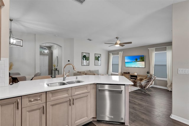 13910 Chalk Hill Pl, Riverview, FL 33579 - kitchen with dishwasher, a sink, open floor plan, arched walkways, and ceiling fan