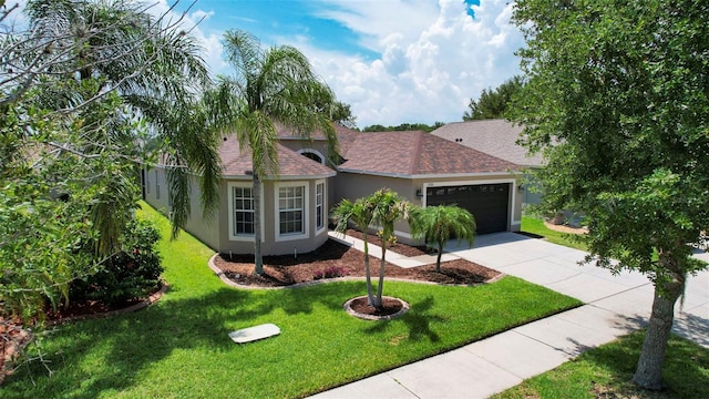 13910 Chalk Hill Pl, Riverview, FL 33579 - ranch-style house featuring stucco siding, a garage, driveway, a front yard, and a shingled roof