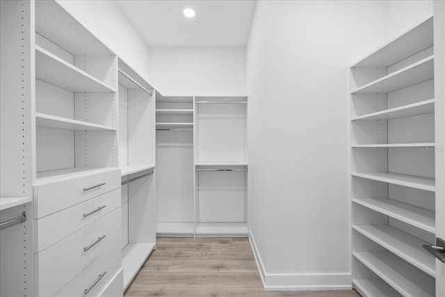 820 Bay Point Dr, Madeira Beach, FL 33708 - walk in closet featuring light wood-type flooring