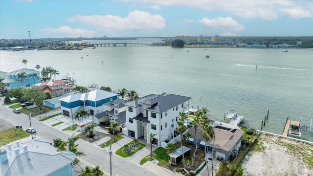 820 Bay Point Dr, Madeira Beach, FL 33708 - aerial view of residential area with a nearby body of water and a notable bridge
