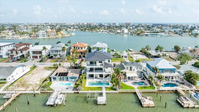 820 Bay Point Dr, Madeira Beach, FL 33708 - aerial view of residential area with a large body of water and a pool area