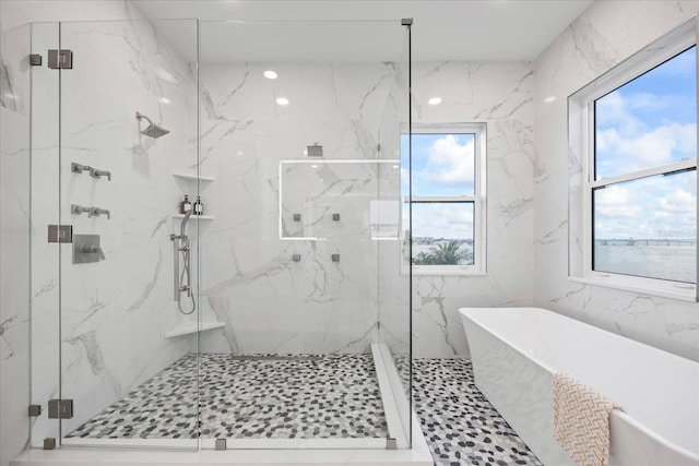 820 Bay Point Dr, Madeira Beach, FL 33708 - bathroom with a freestanding tub and a marble finish shower