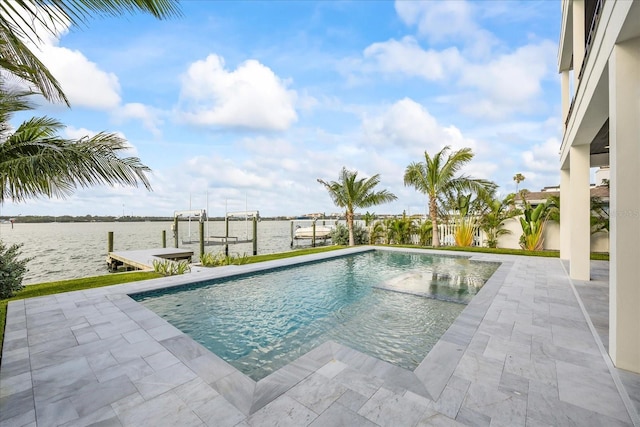 820 Bay Point Dr, Madeira Beach, FL 33708 - swimming pool with a boat dock, boat lift, a water view, and a patio