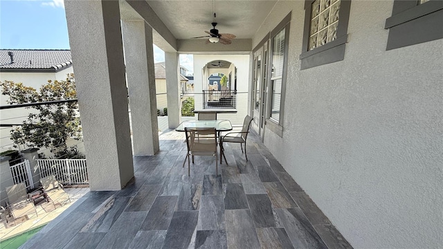 7810 Whitemarsh Way, Reunion, FL 34747 - view of patio / terrace with ceiling fan and a balcony