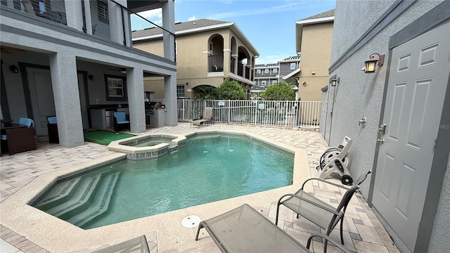 7810 Whitemarsh Way, Reunion, FL 34747 - view of pool with a patio area, a fenced backyard, a pool with connected hot tub, and a ceiling fan