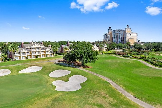 7810 Whitemarsh Way, Reunion, FL 34747 - surrounding community featuring golf course view and a yard