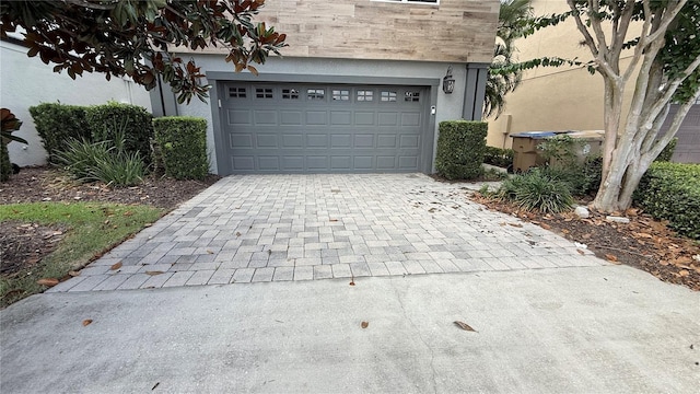7810 Whitemarsh Way, Reunion, FL 34747 - garage with decorative driveway