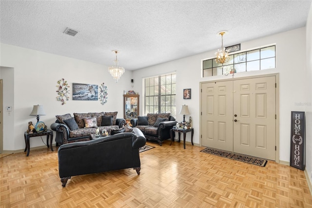 6621 Appaloosa Dr, Tampa, FL 33625 - living area with a chandelier, plenty of natural light, a textured ceiling, and baseboards