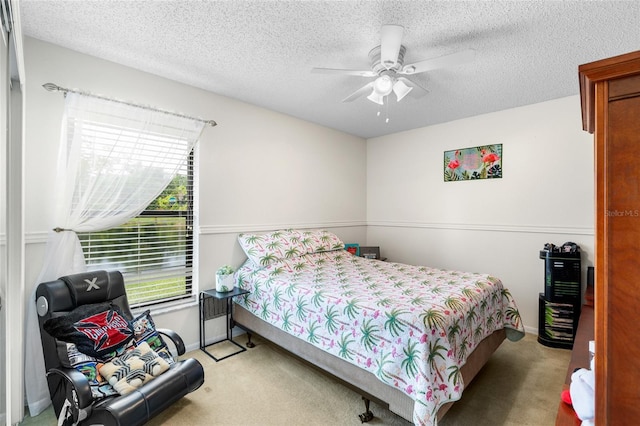 6621 Appaloosa Dr, Tampa, FL 33625 - bedroom featuring carpet flooring, baseboards, a ceiling fan, and a textured ceiling