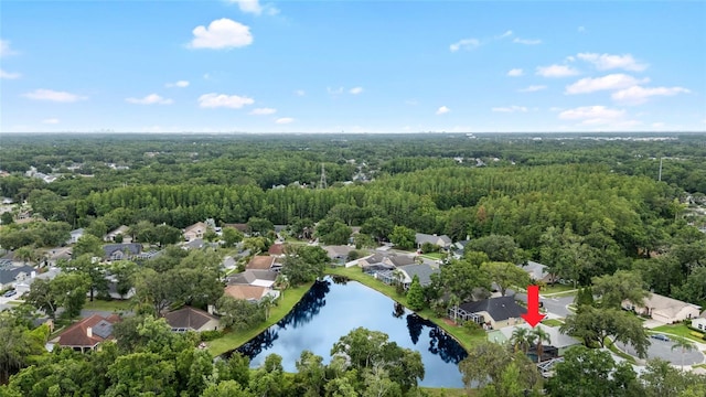 6621 Appaloosa Dr, Tampa, FL 33625 - aerial view of property and surrounding area featuring a forest, a large body of water, and nearby suburban area