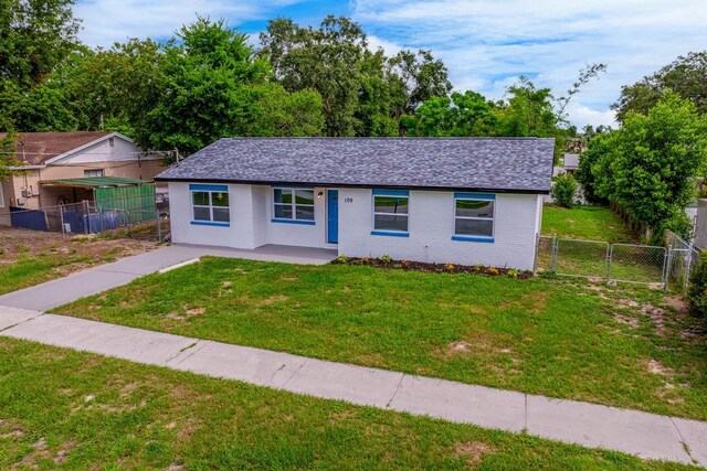 109 Magnolia Ave, Seffner, FL 33584 - ranch-style home with a gate and brick siding
