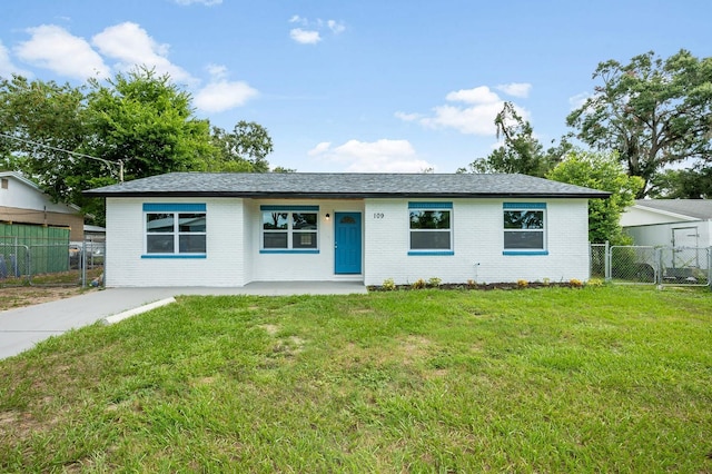 109 Magnolia Ave, Seffner, FL 33584 - ranch-style home with brick siding, a gate, and a porch