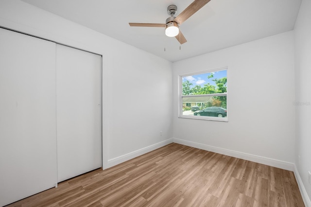 109 Magnolia Ave, Seffner, FL 33584 - unfurnished bedroom with light wood-style floors, a closet, and ceiling fan