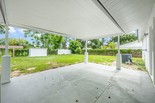 109 Magnolia Ave, Seffner, FL 33584 - fenced backyard featuring a patio area and a shed
