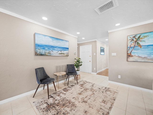 213 Fernwood Cir Unit 213, Seminole, FL 33777 - living area featuring ornamental molding, recessed lighting, tile patterned flooring, and baseboards