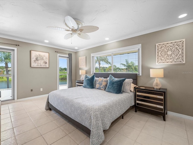 213 Fernwood Cir Unit 213, Seminole, FL 33777 - bedroom featuring access to outside, multiple windows, light tile patterned floors, recessed lighting, and ornamental molding