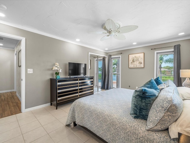 213 Fernwood Cir Unit 213, Seminole, FL 33777 - bedroom with access to outside, crown molding, recessed lighting, baseboards, and a ceiling fan