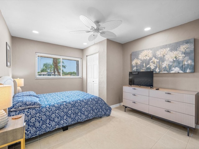 213 Fernwood Cir Unit 213, Seminole, FL 33777 - bedroom featuring a closet, ceiling fan, recessed lighting, light tile patterned floors, and baseboards
