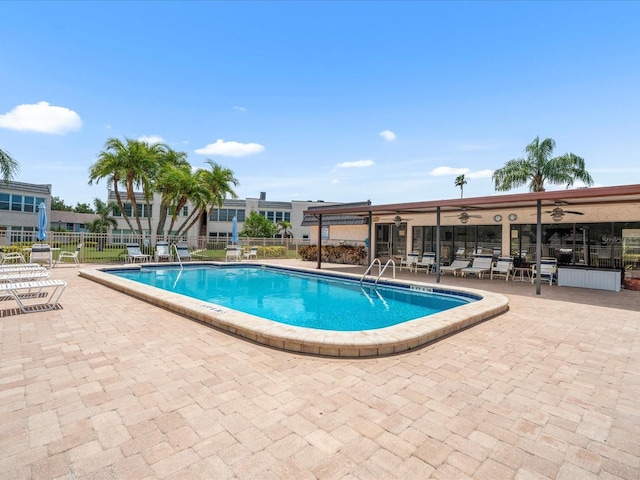 213 Fernwood Cir Unit 213, Seminole, FL 33777 - community pool featuring ceiling fan and a patio