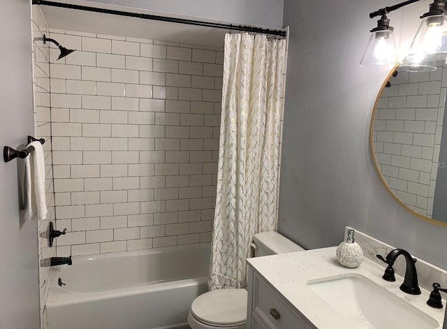 715 2nd Ave NE, Largo, FL 33770 - bathroom featuring toilet, vanity, and shower / bath combo