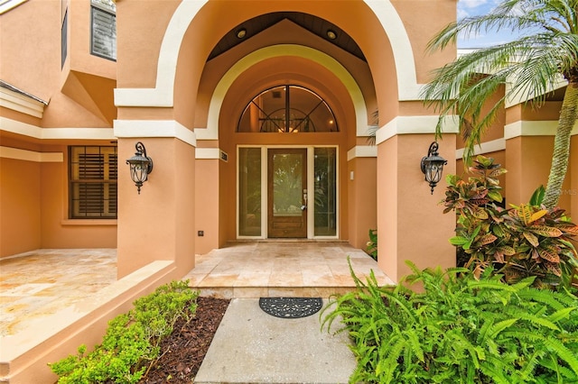 3308 Landing Pl, Palm Harbor, FL 34684 - view of exterior entry with stucco siding