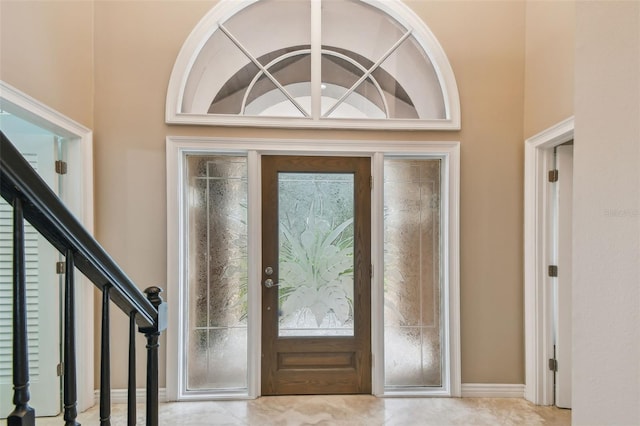 3308 Landing Pl, Palm Harbor, FL 34684 - entryway with stairs and baseboards