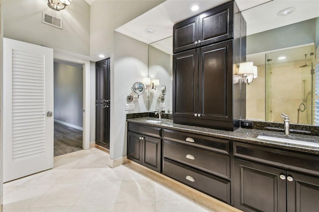 3308 Landing Pl, Palm Harbor, FL 34684 - full bathroom with double vanity, a stall shower, baseboards, tile patterned flooring, and recessed lighting