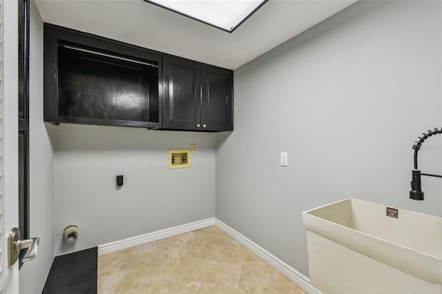 3308 Landing Pl, Palm Harbor, FL 34684 - washroom with hookup for a washing machine, cabinet space, electric dryer hookup, baseboards, and light tile patterned flooring