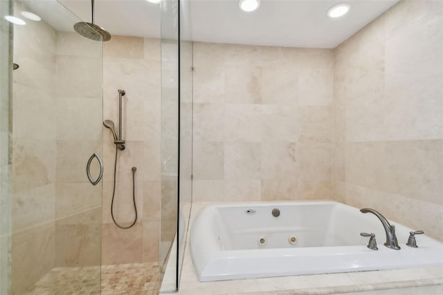 3308 Landing Pl, Palm Harbor, FL 34684 - full bath with a walk in shower, a jetted tub, and recessed lighting