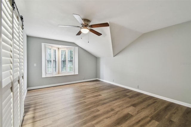 3308 Landing Pl, Palm Harbor, FL 34684 - additional living space with wood finished floors, ceiling fan, lofted ceiling, and baseboards