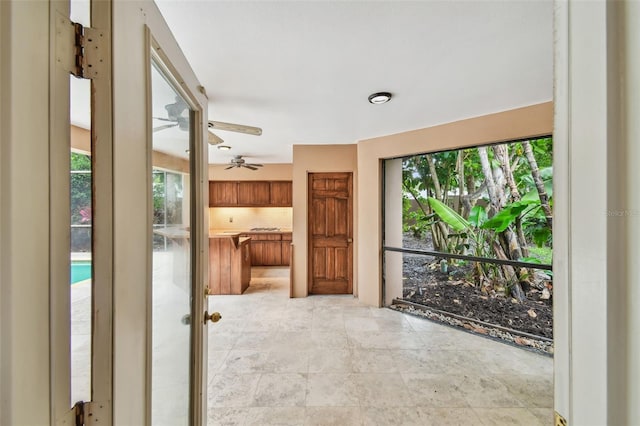 3308 Landing Pl, Palm Harbor, FL 34684 - unfurnished living room featuring ceiling fan