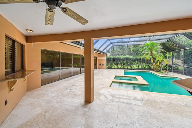 3308 Landing Pl, Palm Harbor, FL 34684 - view of pool featuring a ceiling fan, a patio area, a pool with connected hot tub, and glass enclosure