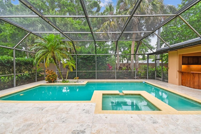 3308 Landing Pl, Palm Harbor, FL 34684 - view of swimming pool featuring a patio, glass enclosure, and a pool with connected hot tub