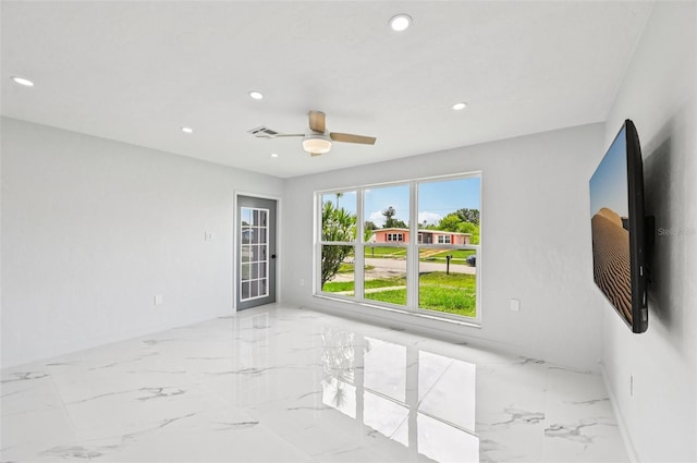 7930 Jeffery Ave, North Port, FL 34287 - spare room featuring light marble finish flooring, recessed lighting, and ceiling fan