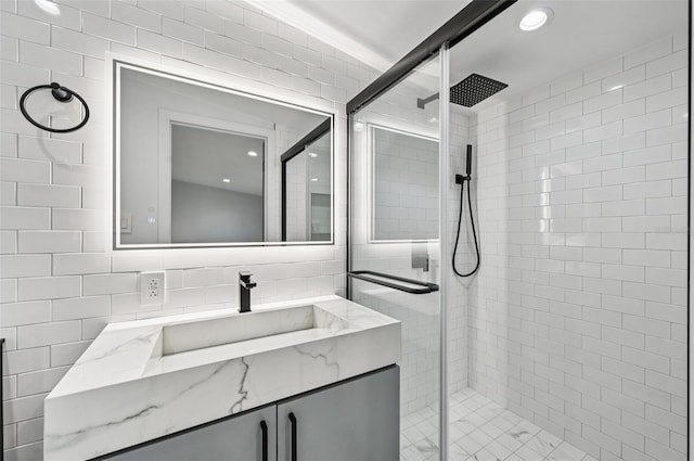 7930 Jeffery Ave, North Port, FL 34287 - full bath featuring tile walls, vanity, and a shower stall
