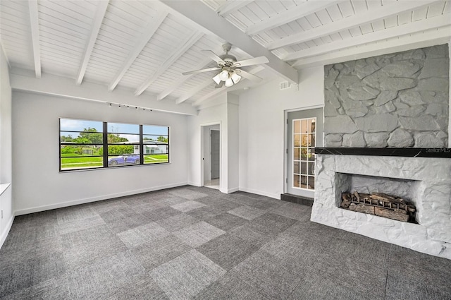 7930 Jeffery Ave, North Port, FL 34287 - unfurnished living room featuring dark colored carpet, baseboards, ceiling fan, and a fireplace