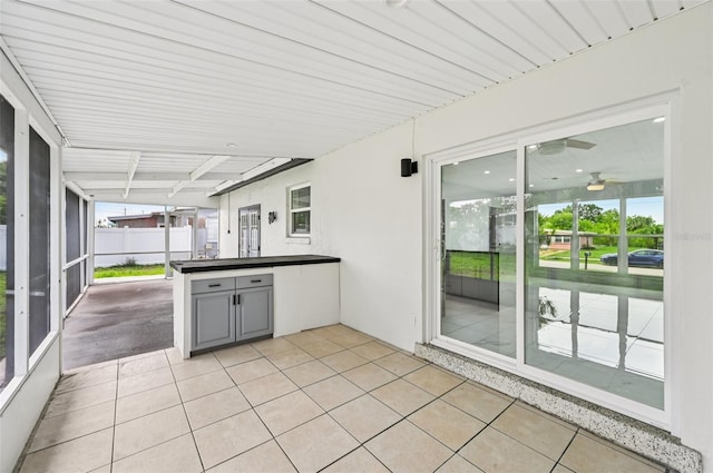 7930 Jeffery Ave, North Port, FL 34287 - unfurnished sunroom with a ceiling fan