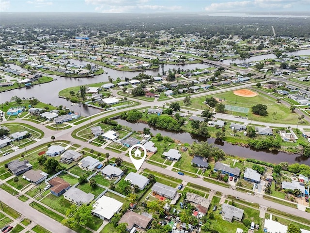 7930 Jeffery Ave, North Port, FL 34287 - aerial view of property's location with nearby suburban area and a large body of water