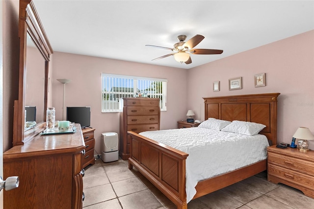 7276 21st St N, Saint Petersburg, FL 33702 - bedroom featuring light tile patterned flooring, an office area, and ceiling fan
